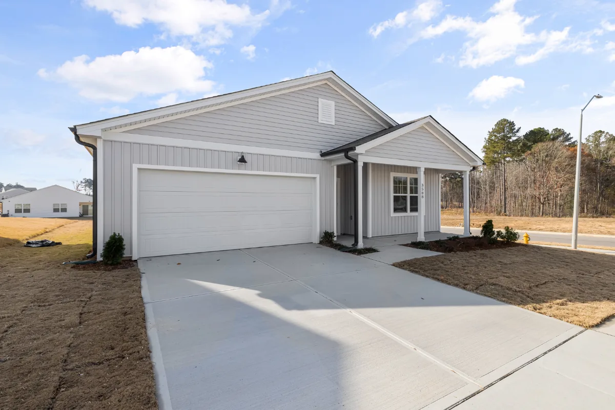 Home with freshly poured concrete driveway near Baldwin, NY — Nassau County Concrete
