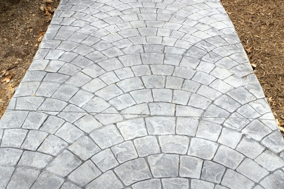 Stamped cobblestone-pattern concrete walkway near Baldwin NY — Nassau County Concrete